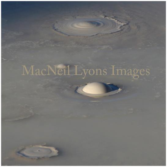Bubbling Mud Pot - Copyright MacNeil Lyons Images